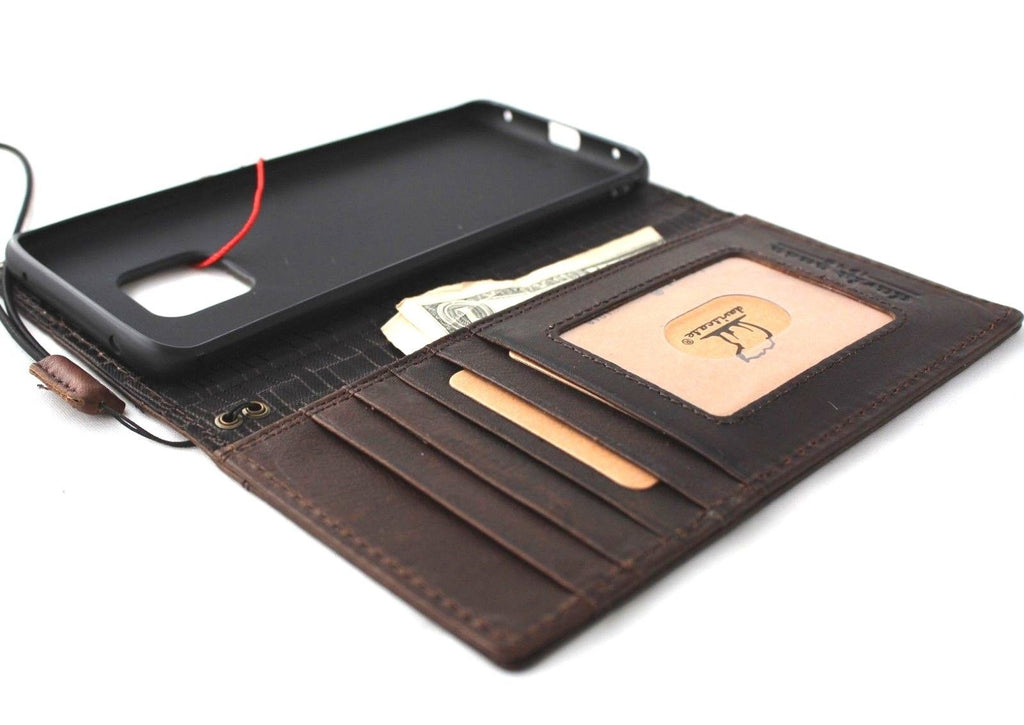 Handmade genuine leather book wallet case for Huawei Mate 20 Pro by DAVISCASE, featuring retro design and wireless charging compatibility.