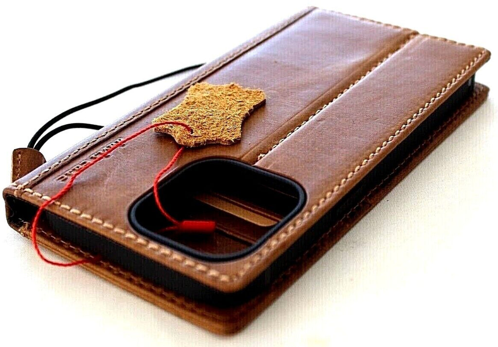 Handmade tan leather phone case for iPhone 12-16 Pro Max with embossed cross of Jesus, designed by DAVISCASE.
