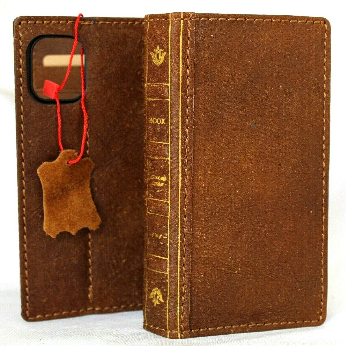 Genuine tan leather iPhone 12 Mini book wallet case with vintage Bible style design and card slots, by DAVISCASE.