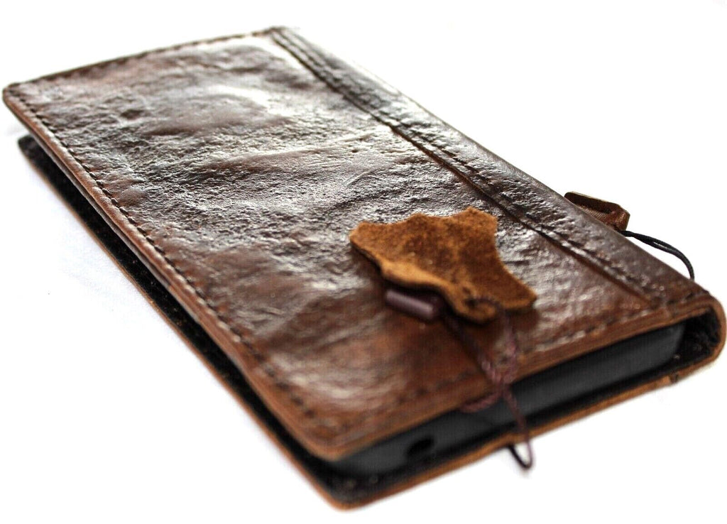 Genuine leather case for Google Pixel 7 Pro by DAVISCASE, featuring a retro rustic wallet design with stand and wireless charging compatibility.