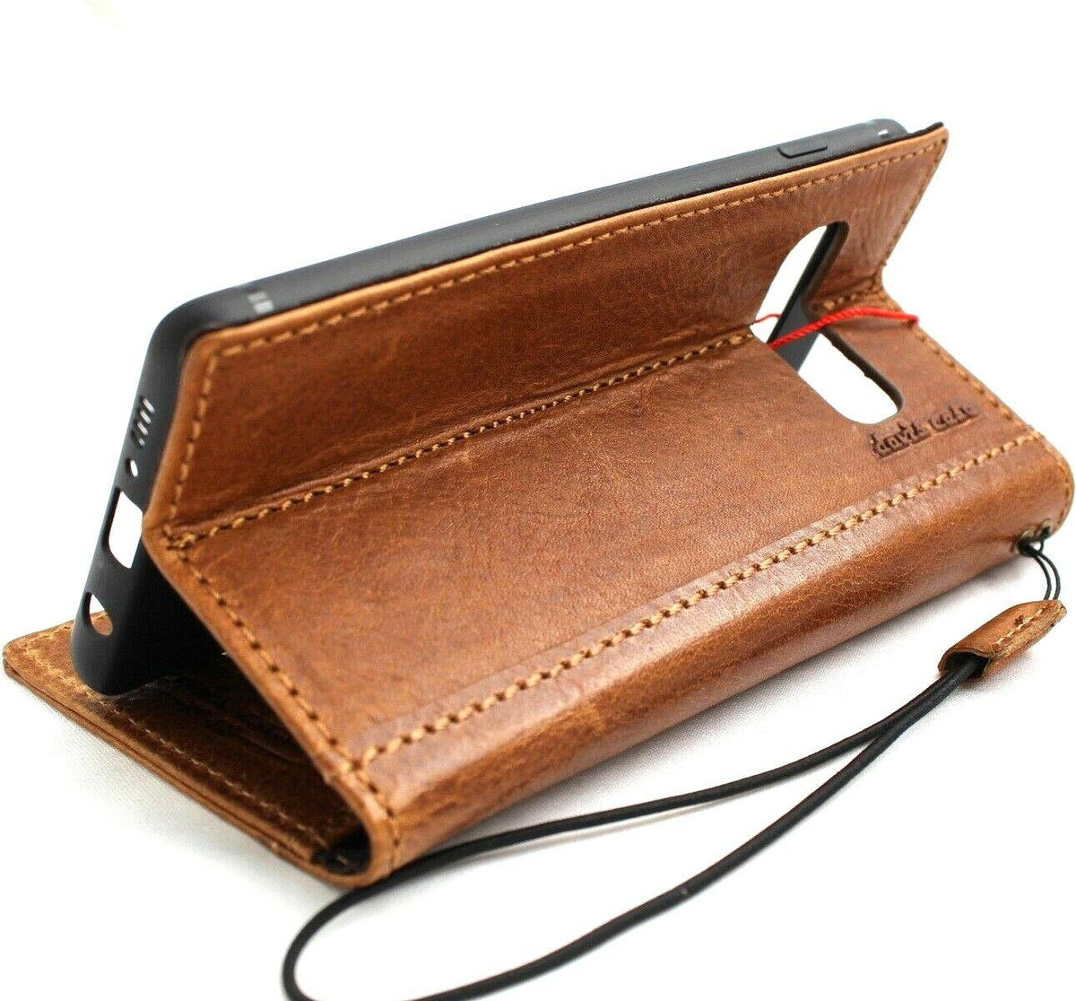 Genuine leather Samsung Galaxy S10e wallet case with card slots, strap, and charging cutout in tan from DAVISCASE