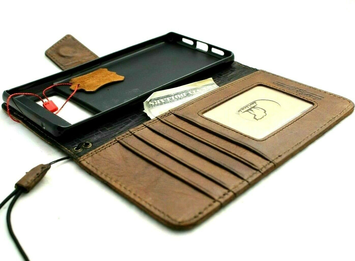 Dark brown genuine leather Google Pixel 7 Pro case by DAVISCASE with magnetic closure, stand feature, and wireless charging compatibility.