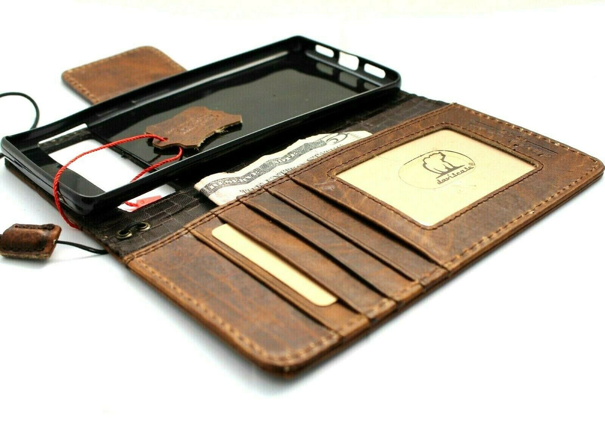 Genuine leather Google Pixel phone case by DAVISCASE with wallet style, magnetic closure, retro cross design, for Pixel 6, 7, 8A, and 6A.