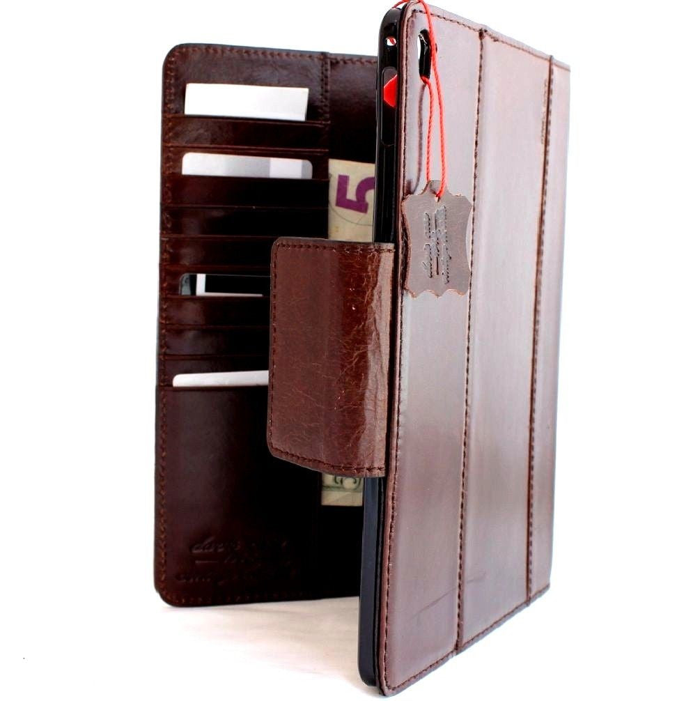 Brown genuine leather iPad Pro 9.7 case by DAVISCASE with card slots, flip cover, and magnetic stand for Apple tablet protection.