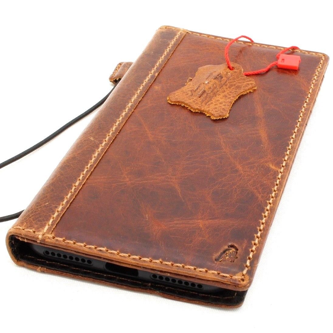 Handmade vintage leather iPhone 8 Plus case with card slots, slim wallet cover and book-style design in classic leather.