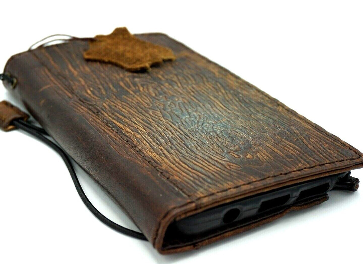 Handmade genuine leather phone case for iPhone 11-15 Pro Max, with vintage style wallet design and credit card slots by DAVISCASE.