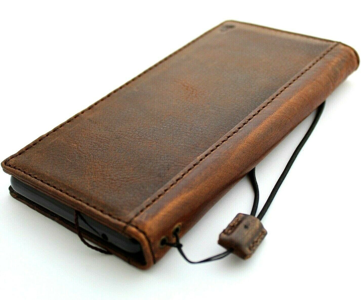 Dark retro leather wallet case for OnePlus 12, 13, 15, and 13R by DAVISCASE, featuring stand function and wireless charging compatibility.