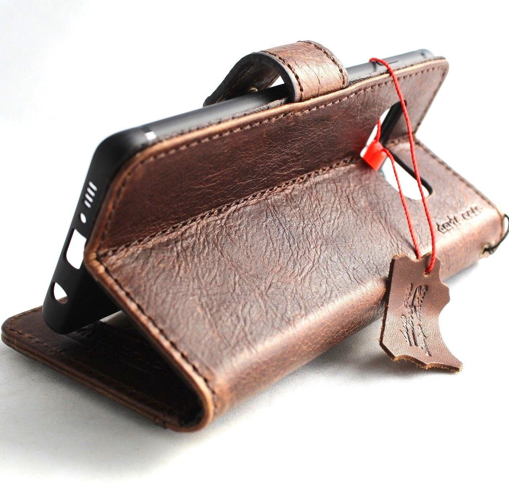 Genuine leather book wallet case for Samsung Galaxy S10e by DAVISCASE with card slots, stand feature, and magnetic closure.