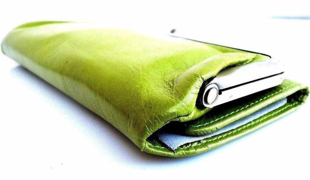 Green genuine leather women's wallet with card slots, coin pouch, and clutch design from DavisCase.