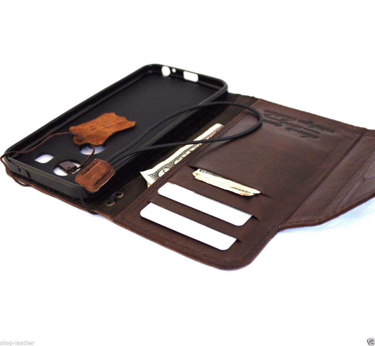 Dark brown genuine Italian leather hard case for LG Nexus 5X with card slots, wallet-style cover, and magnetic closure.