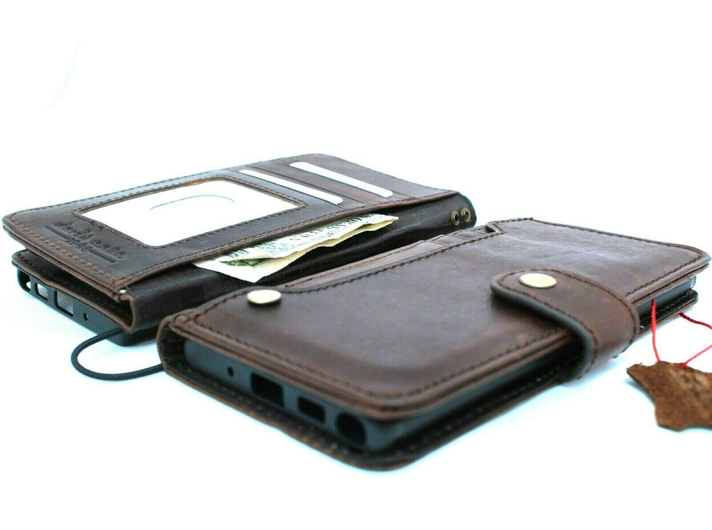Genuine leather Samsung Galaxy Note 10 book wallet case with card slots, button closure, flip design, and rubber strap.