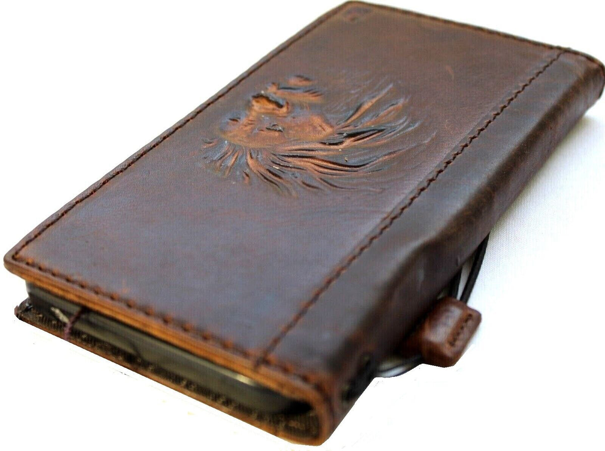 Handmade leather phone case for Galaxy S22, S21, Z Fold, and Note models with vintage lion design and wallet-style cover.