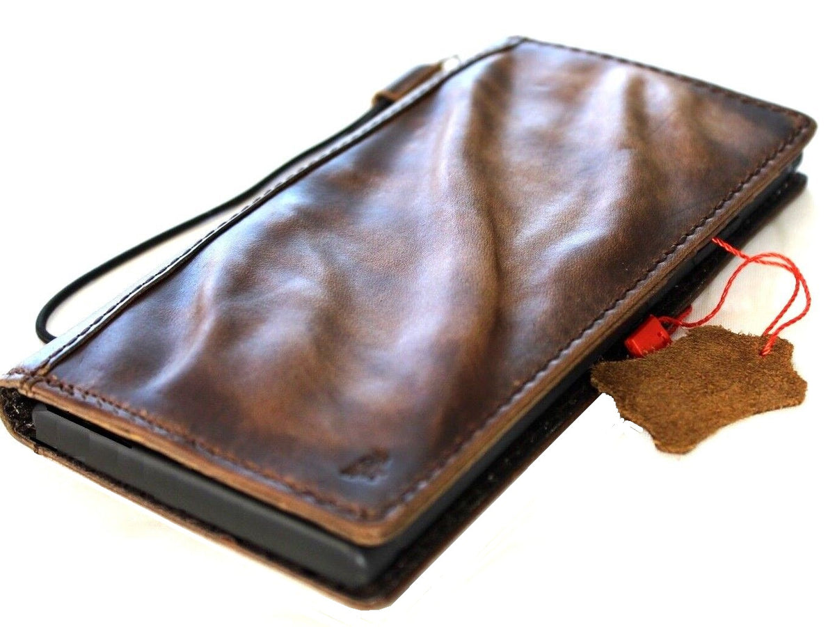Handcrafted vintage leather phone case by DAVISCASE for iPhone 11 to 15, with card slots and full grain leather design.