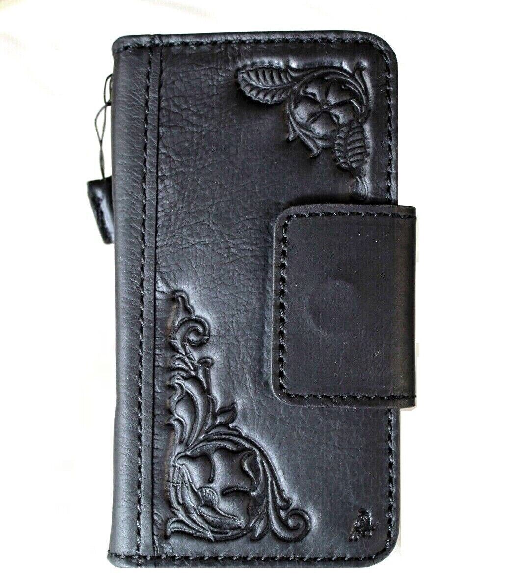 Black genuine leather Google Pixel 7 Pro case with magnetic closure, stand, and embedding decorations, designed for wireless charging.