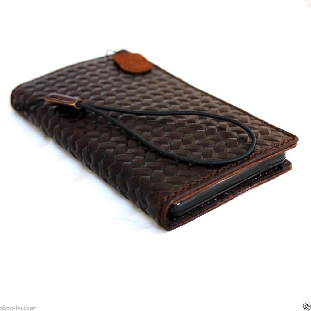 Handmade genuine Italian leather iPhone 6 Plus wallet case with card slots and magnetic band, crafted for a slim, stylish look.