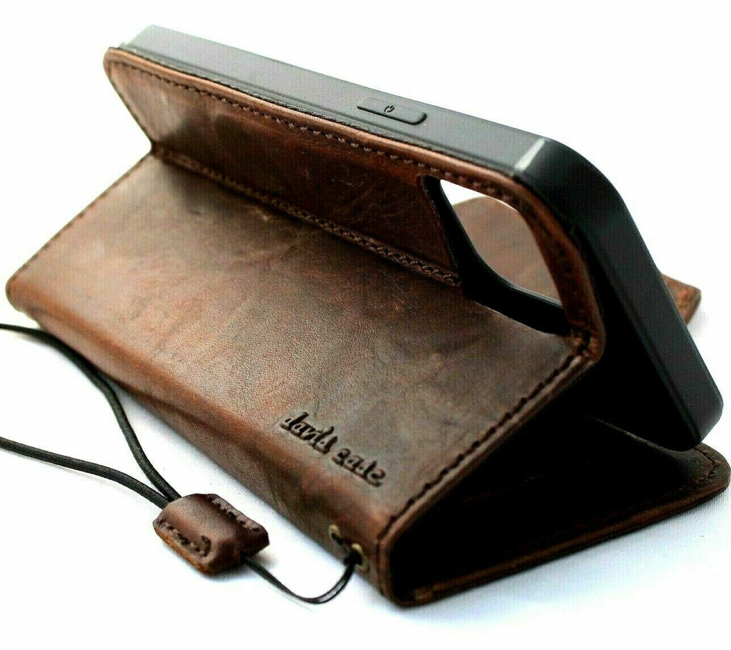 Genuine dark leather iPhone 11 Pro Max wallet case with credit card holder, rubber strap, and wireless charging compatibility by DAVISCASE.