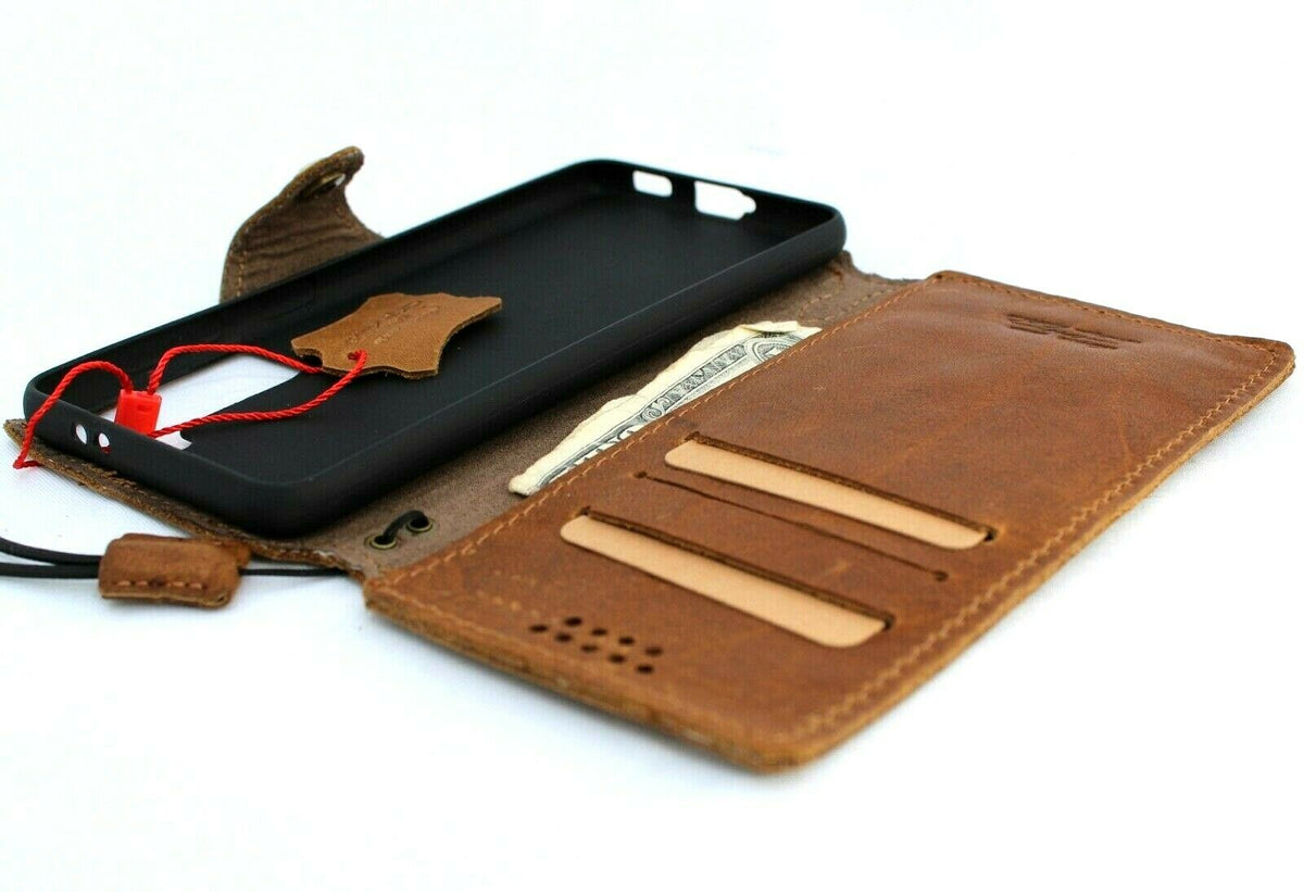 Handmade genuine leather wallet case for Samsung Galaxy S21 by DavisCase, slim tan book-style cover with rubber holder and wireless charging.