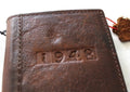 Genuine leather Google Pixel 7 Pro case with book wallet design, rustic vintage style, stands for viewing, wireless charging compatible.