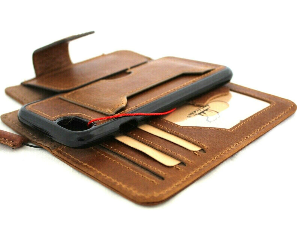 Genuine full tanned leather iPhone 8 case with wallet card slots, ID window, rubber holder strap, and wireless charging compatibility.