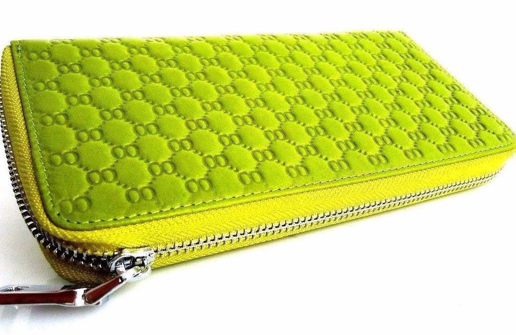 Green genuine leather women's purse and clutch bag from DAVISCASE, featuring a tote design with wallet and coin compartments.