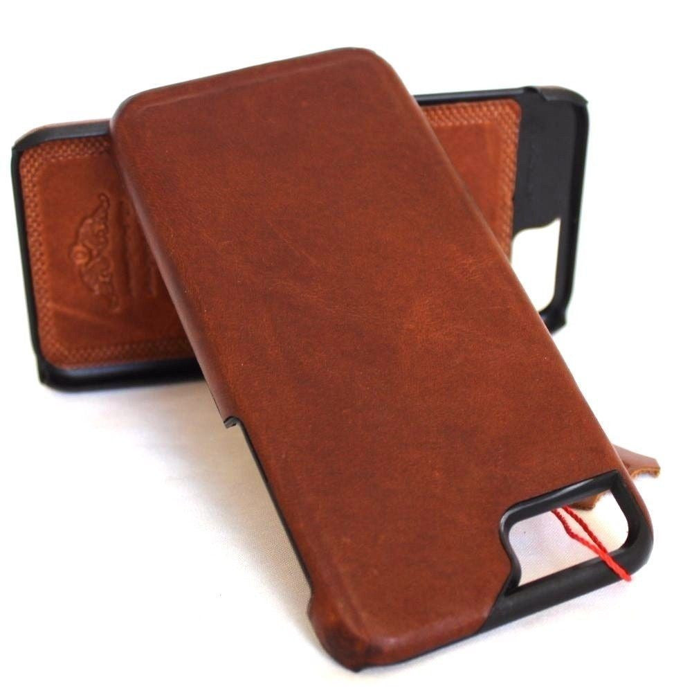 Vintage leather iPhone 8 Plus case with slim book-style holder, handcrafted luxury phone cover.