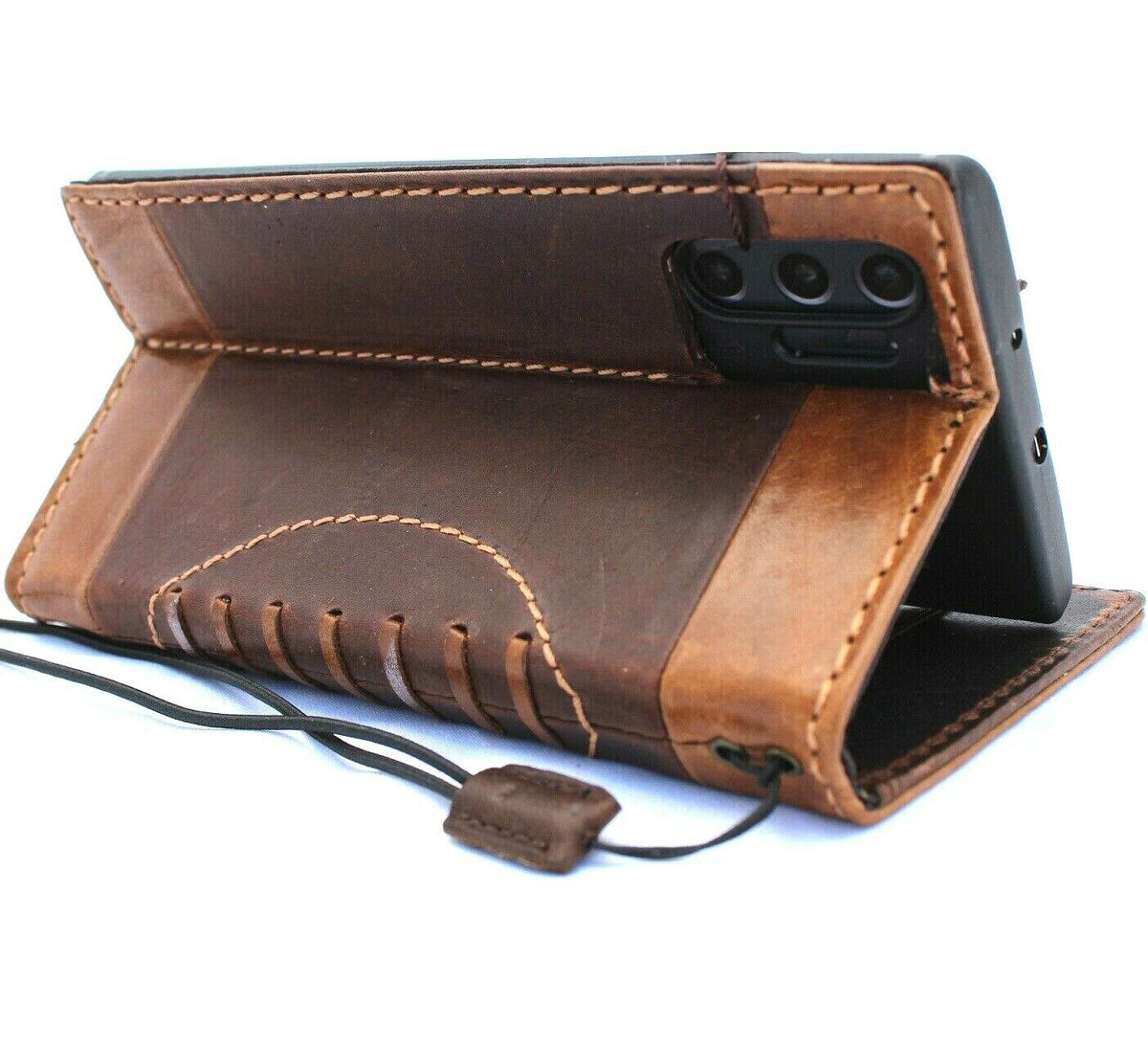 Genuine leather wallet case for Samsung Galaxy Note 10 Plus by DAVISCASE with card slots, ID window, and rubber stand feature.