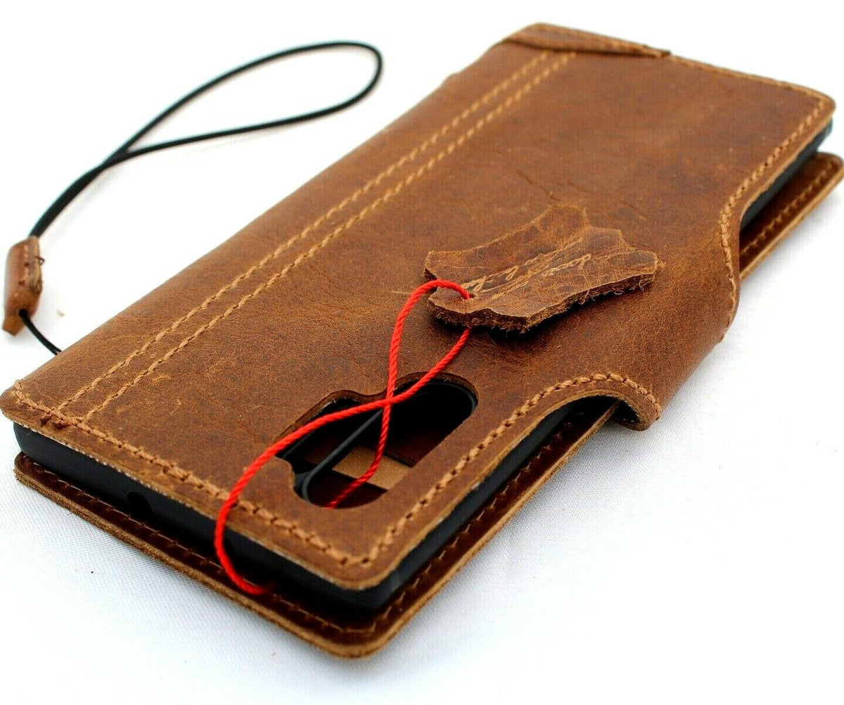 Vintage tan leather case for Samsung Galaxy Note 10 Plus by DAVISCASE, with card slots, rubber stand, slim design, and wireless charging.