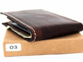 Men's brown leather bifold wallet with 4 credit card slots and 1 bill compartment, slim design for everyday use.