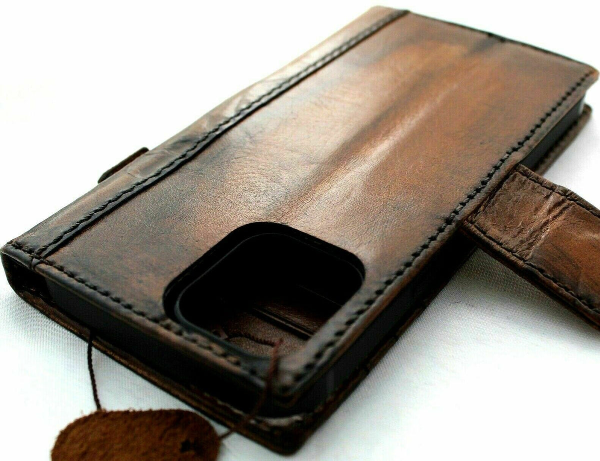 Genuine dark leather iPhone 11 Pro case by DAVISCASE with vintage wallet design, credit card slots, magnetic closure, and slim fit.
