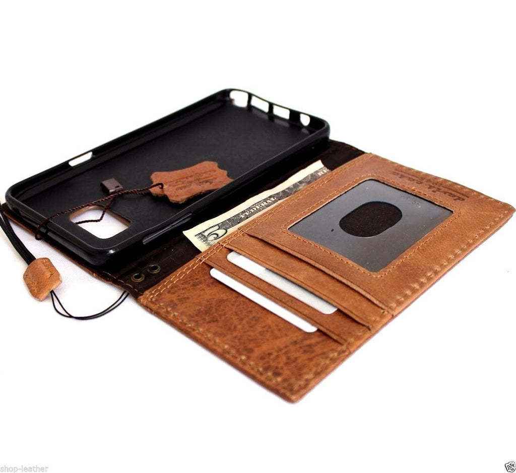 Genuine full leather Samsung Galaxy Note 5 wallet case with a slim, luxurious book-style cover and handmade craftsmanship.