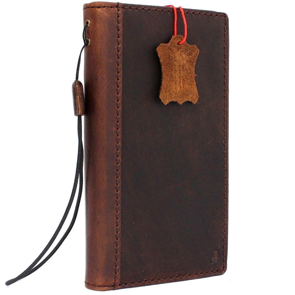 Vintage genuine leather Samsung Galaxy S9 Plus wallet case with card slots, embossing, and space for wireless charging.