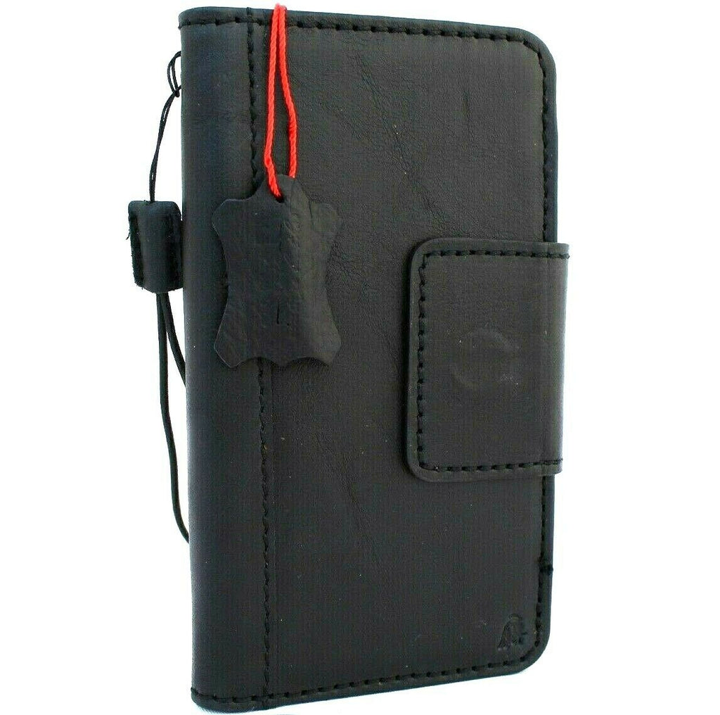 Black DAVISCASE genuine leather wallet case for Samsung Galaxy S10 with card slots, wireless charging holder, and magnetic closure.