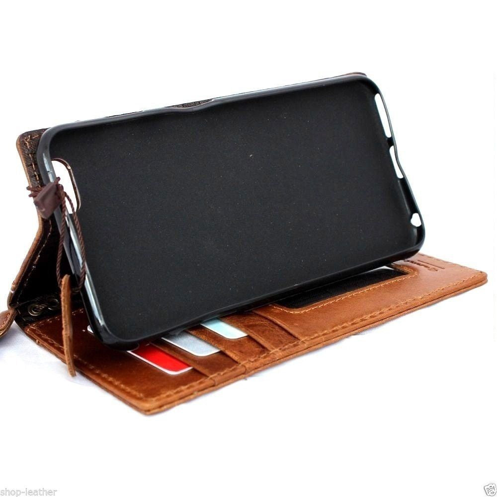 Genuine Italian leather iPhone 6 Plus case with wallet band, credit card slots, and flip cover in slim, handcrafted design.