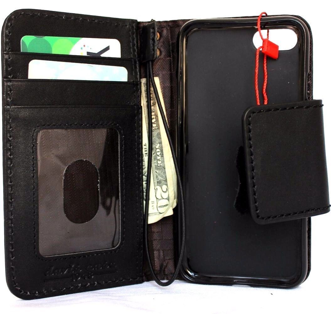 Black genuine leather iPhone 8 case with book wallet design, card slots, and magnetic closure for secure, slim protection.
