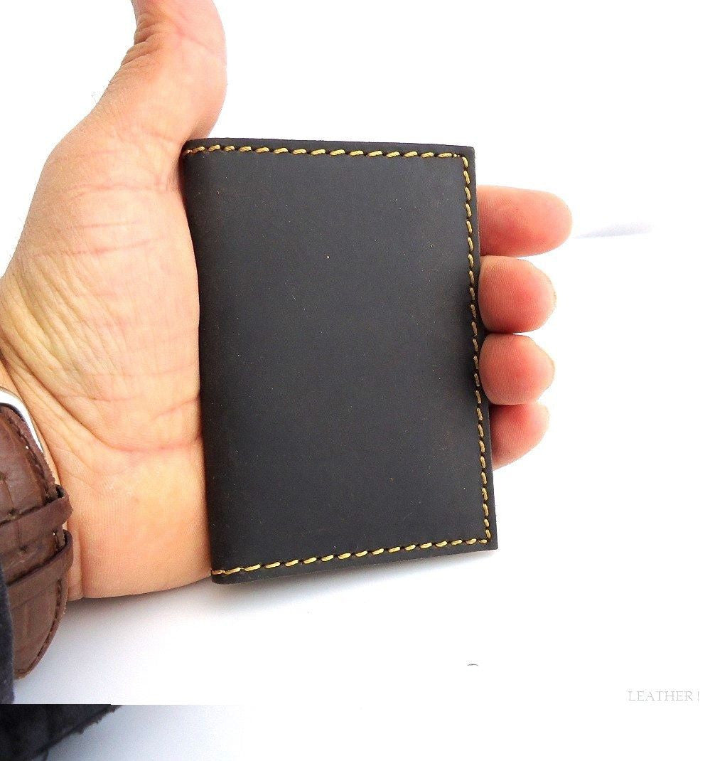 Brown men's full leather bifold card case with four card slots and two slip pockets, slim mini wallet for back pocket use.