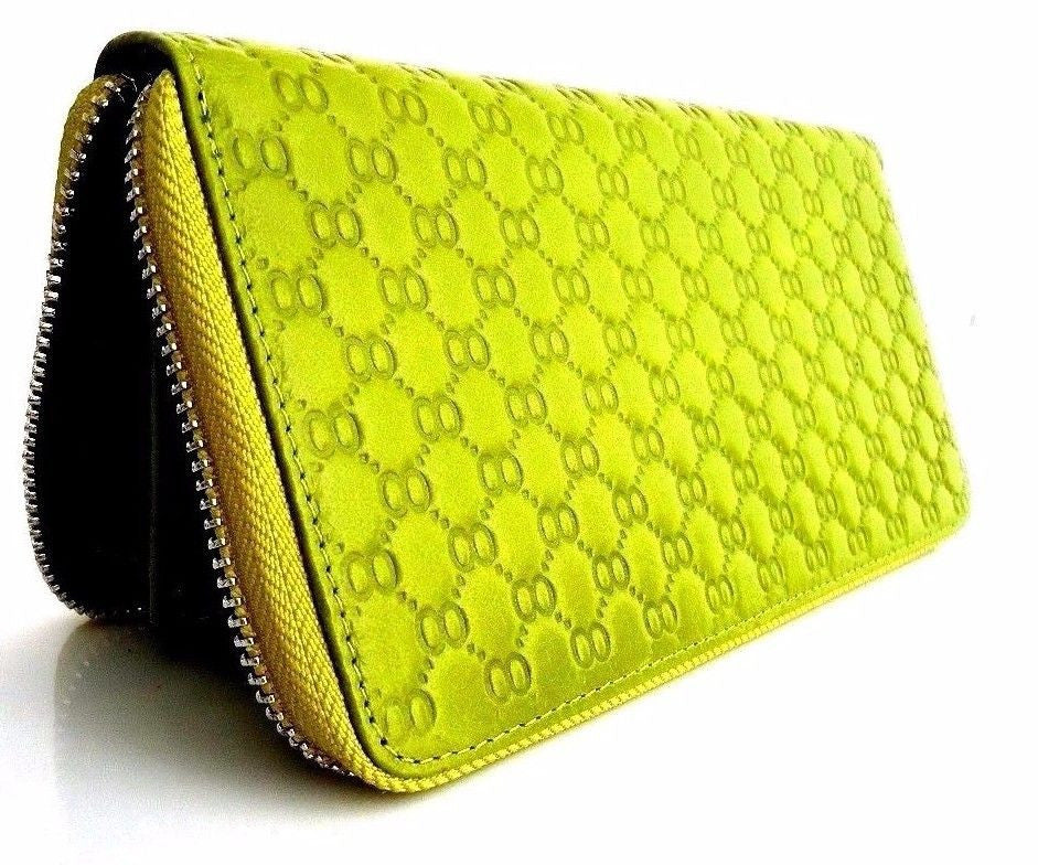 Green genuine leather women's purse and clutch tote with coin compartment, branded DAVISCASE, featuring a sleek, stylish design.