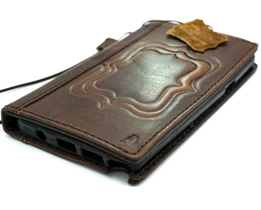 Handmade DAVISCASE genuine leather phone case for iPhone 12-16 Pro Max and 8 Plus, featuring vintage style, embossed design, and wallet features.