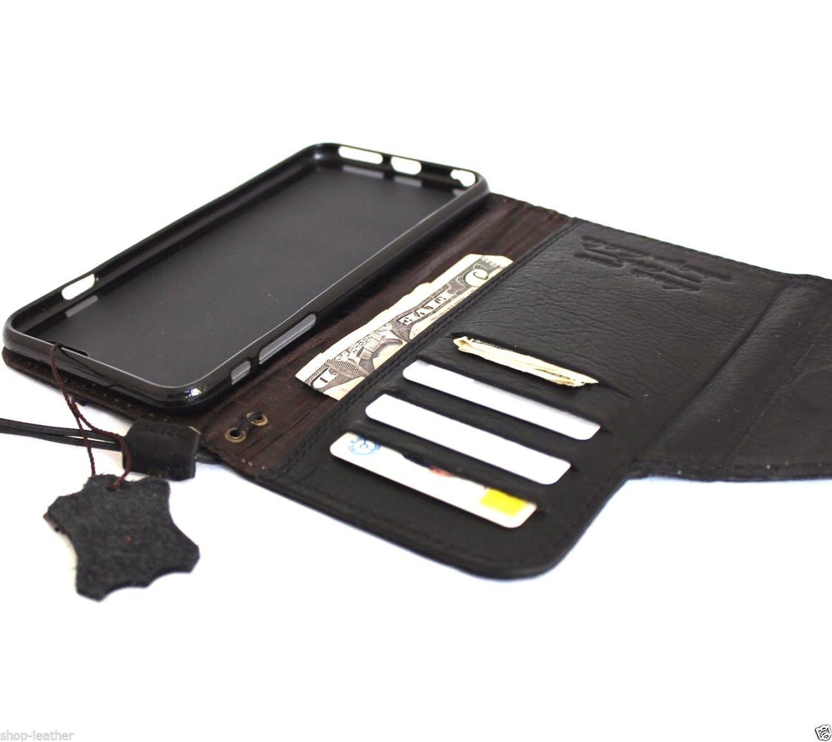 Black genuine leather iPhone 6s Plus case with wallet design, card slots, and magnetic closure, handmade by vendor-unknown.