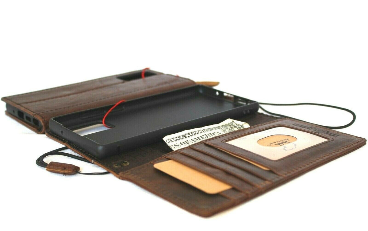 Genuine leather book wallet case for OnePlus 15 by DAVISCASE, featuring card slots, wireless charging holder, and ID window.