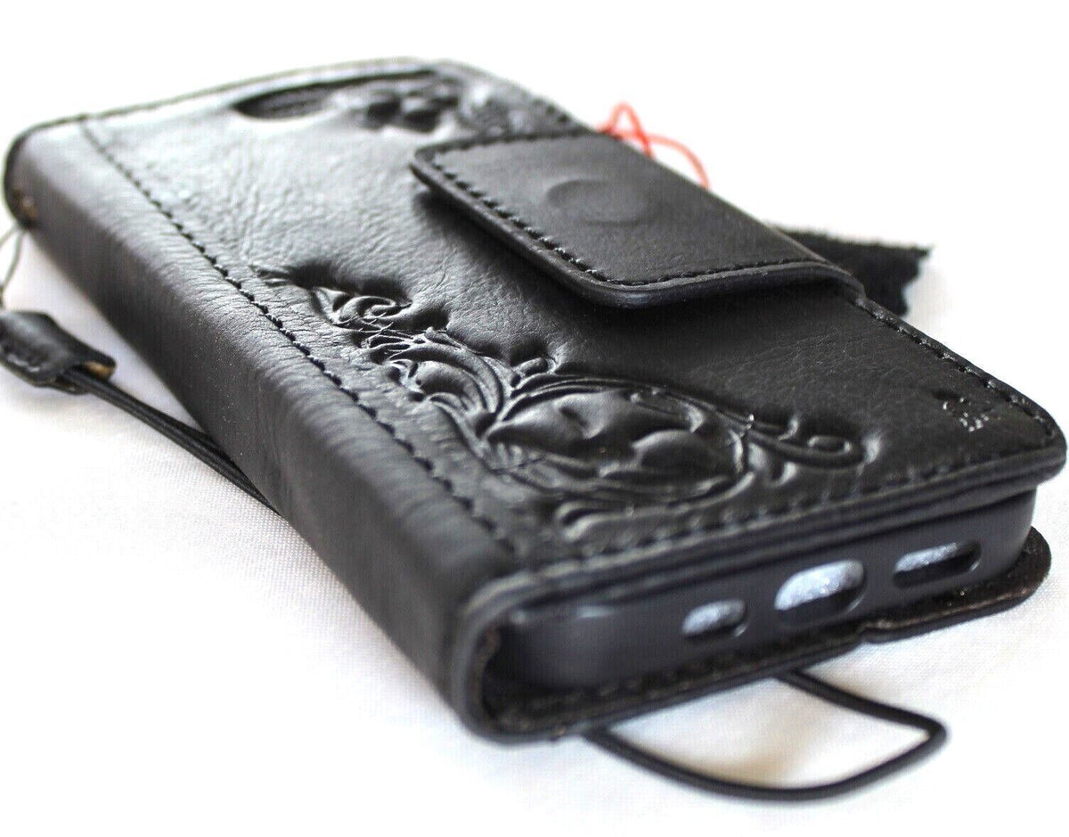 Black genuine leather Google Pixel 7 Pro case with magnetic closure, wallet design, stand feature, and embedding decorations by DAVISCASE.