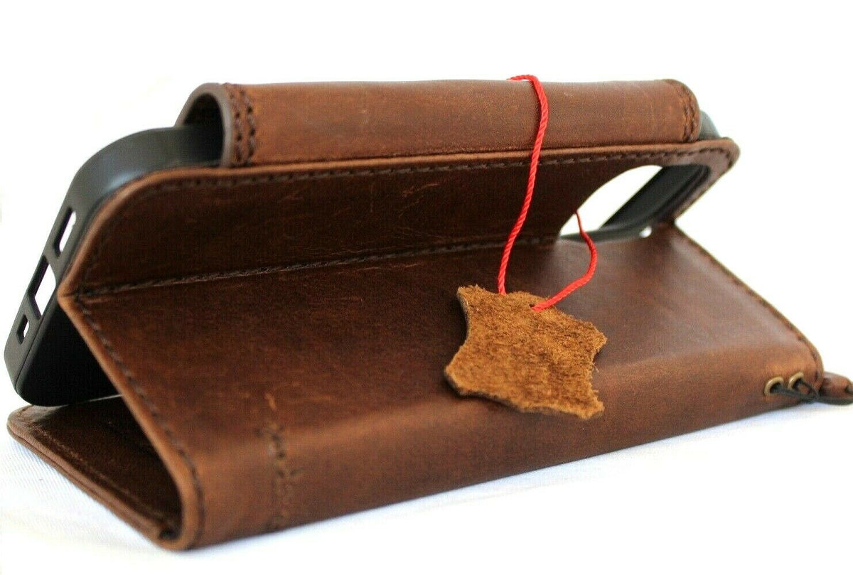 Handmade genuine soft leather iPhone 12 case with wallet design, credit card slots, vintage style, and secure closure by DAVISCASE.
