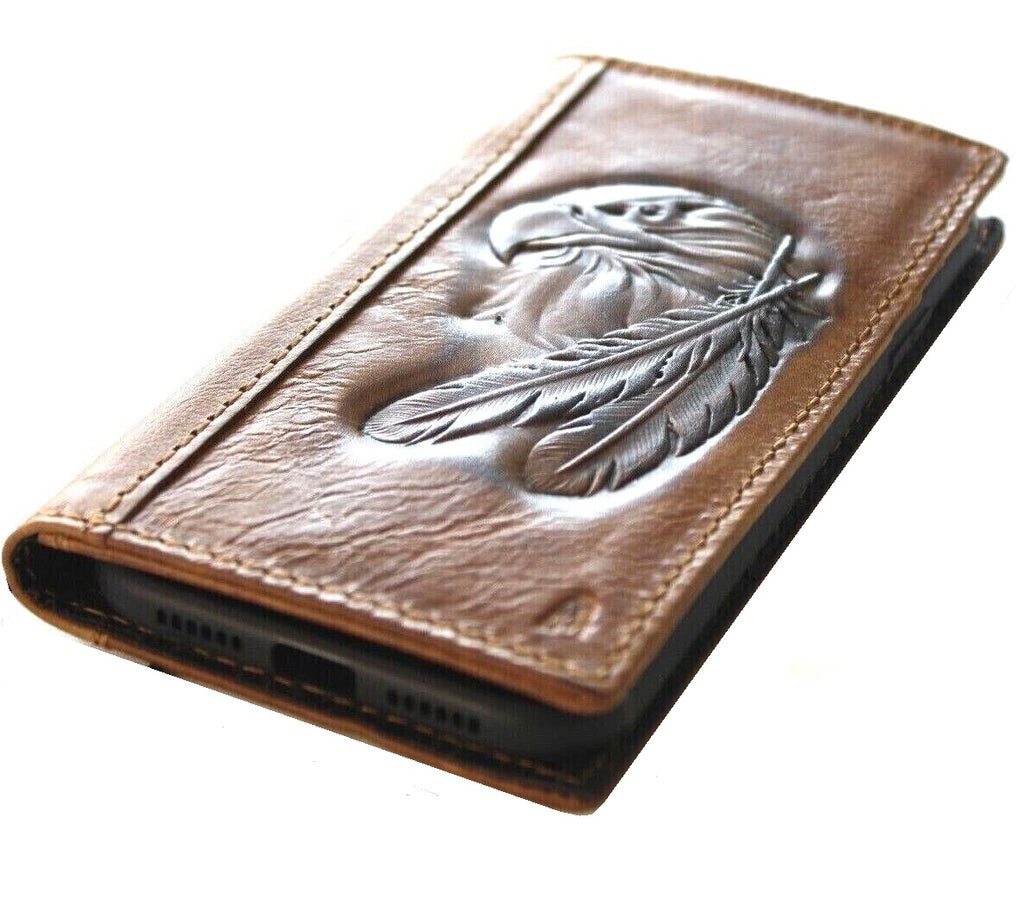 Handmade vintage tan leather phone case for iPhone 12-16 Pro Max, featuring eagle craft stamping and wallet-style design.