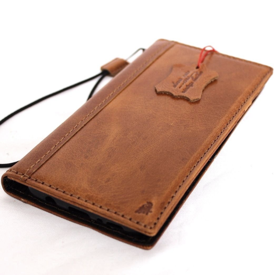 Handmade light brown leather wallet case for Samsung Galaxy S8 Plus with vintage design and slim profile.