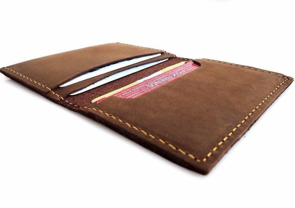 Men's DAVISCASE natural soft leather credit card case with four slots, two slip pockets, slim bi-fold design in classic tan.