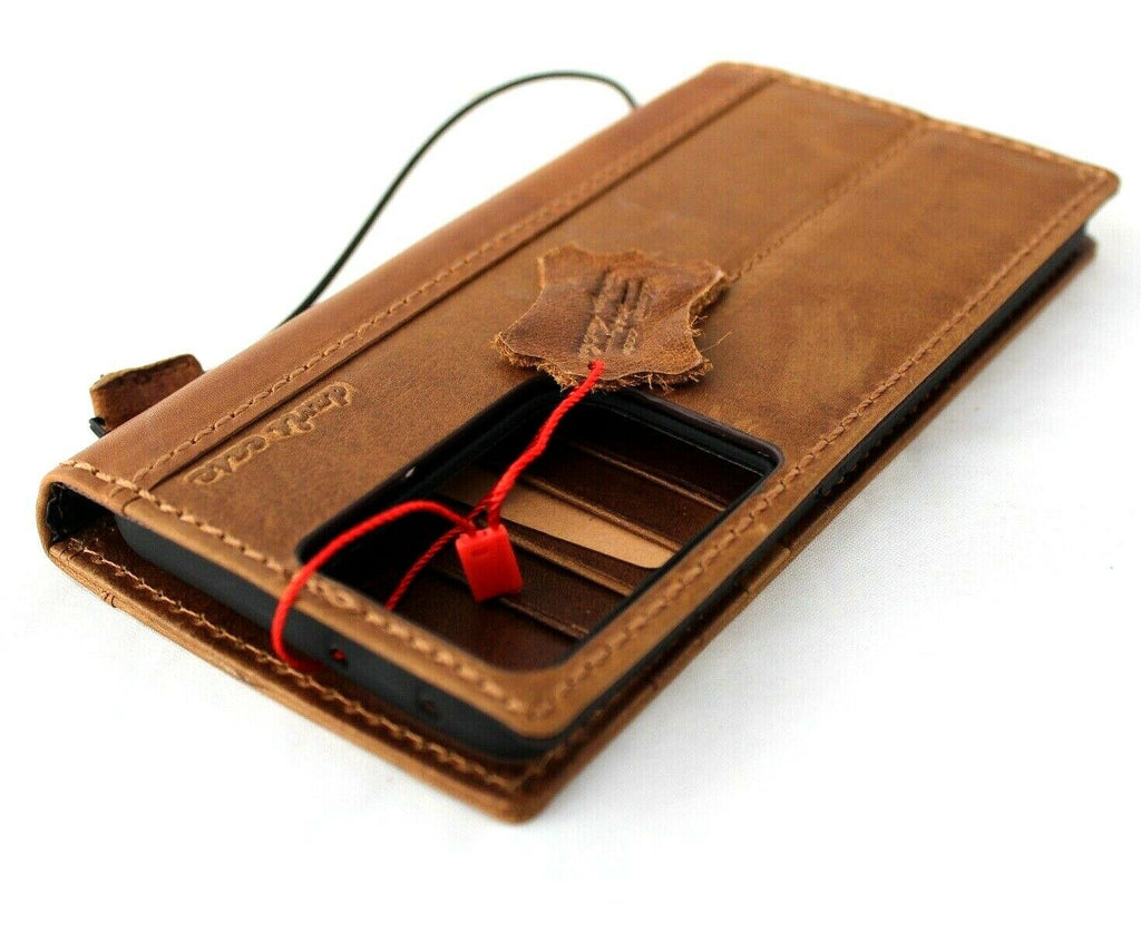 DavisCase genuine leather wallet case for Samsung Galaxy S21 Ultra with card slots, wireless charging holder, and luxury rubber accents