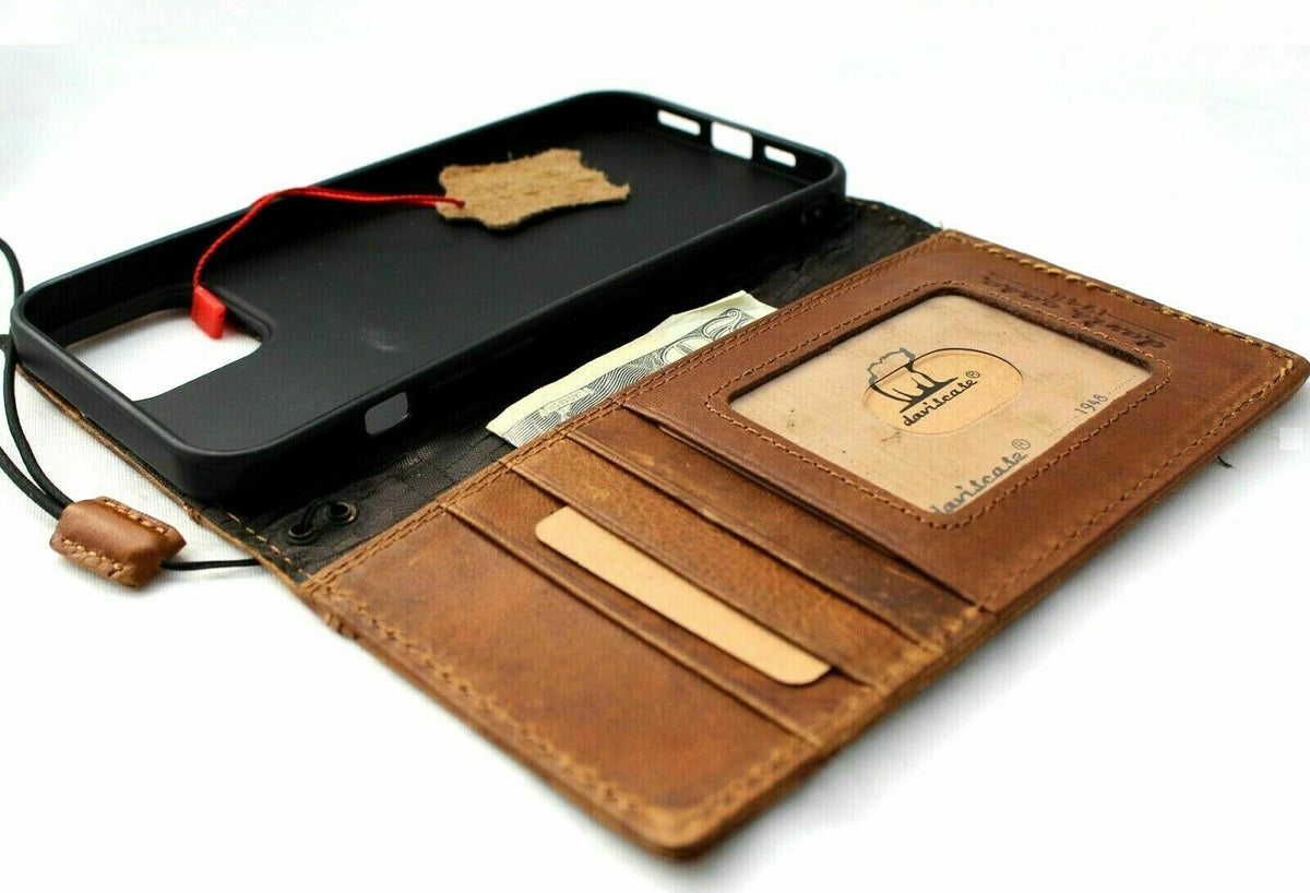 Handcrafted genuine leather wallet case for iPhone 11-15 Pro Max, with dog paw design, credit card slots, and vintage tiger stamping.