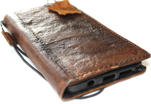 Genuine leather Google Pixel 7 Pro case by DAVISCASE with retro rustic design, wallet features, stand, and wireless charging compatibility