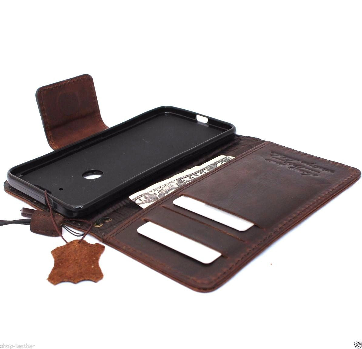 Handmade brown genuine leather phone case for Huawei Nexus 6P with retro art design and magnetic book wallet closure.