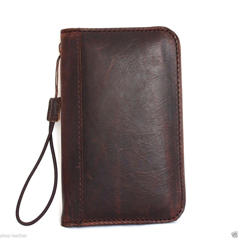 Handcrafted dark Italian leather iPhone 8 book wallet cover, slim handmade case with card slots for stylish protection.