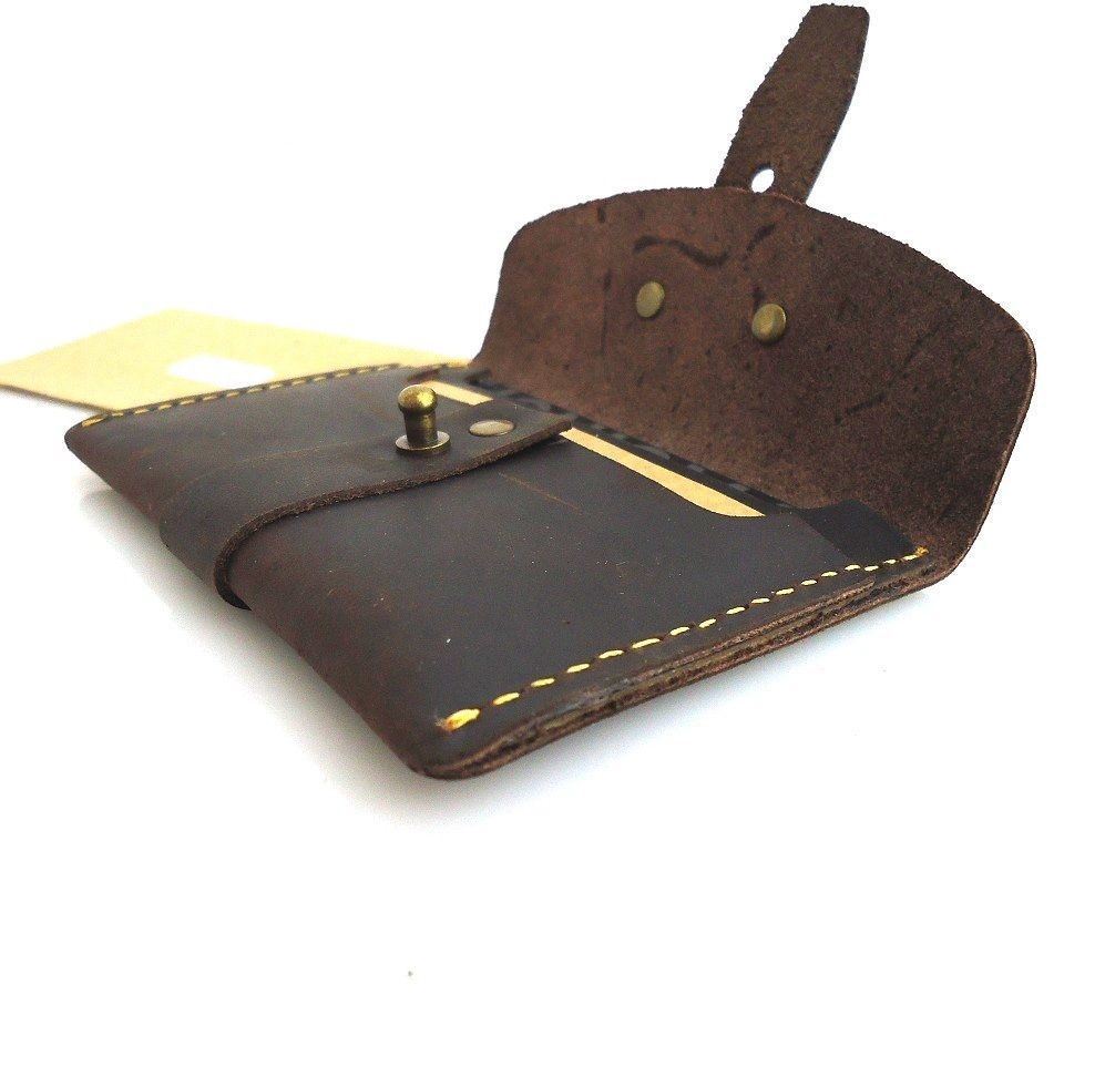 Genuine full leather men's wallet with multiple card slots and money pocket, compact design in a natural leather finish.